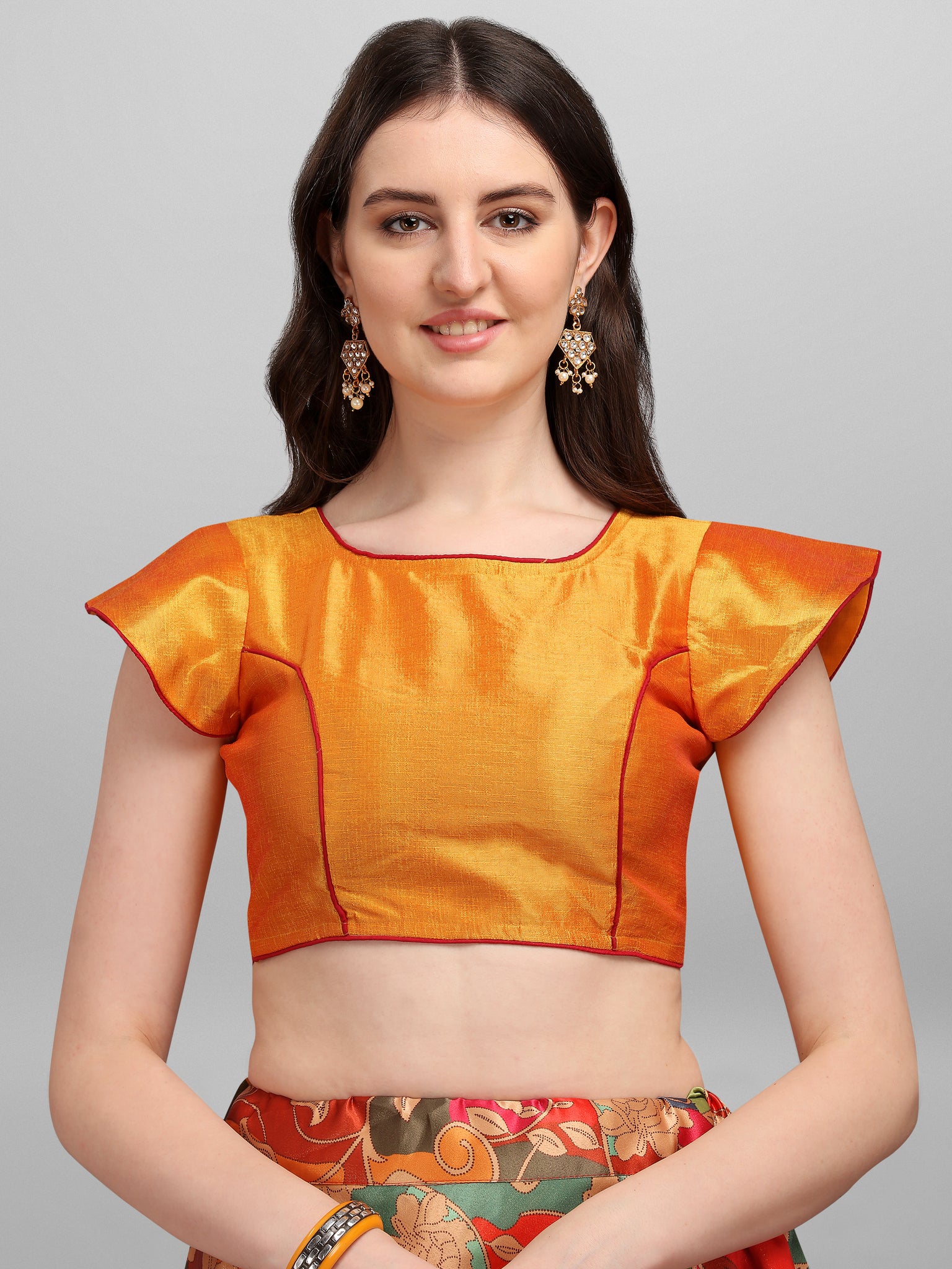 Designer Orange Silk Lehenga Choli with Heavy Floral Print