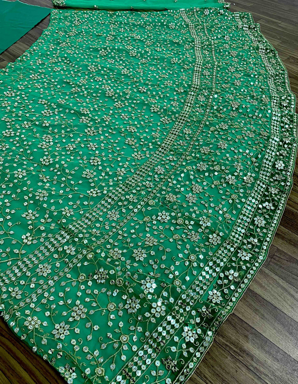Green Net Multi Needle Embroidered Zari Work Wedding Wear Lehenga Choli