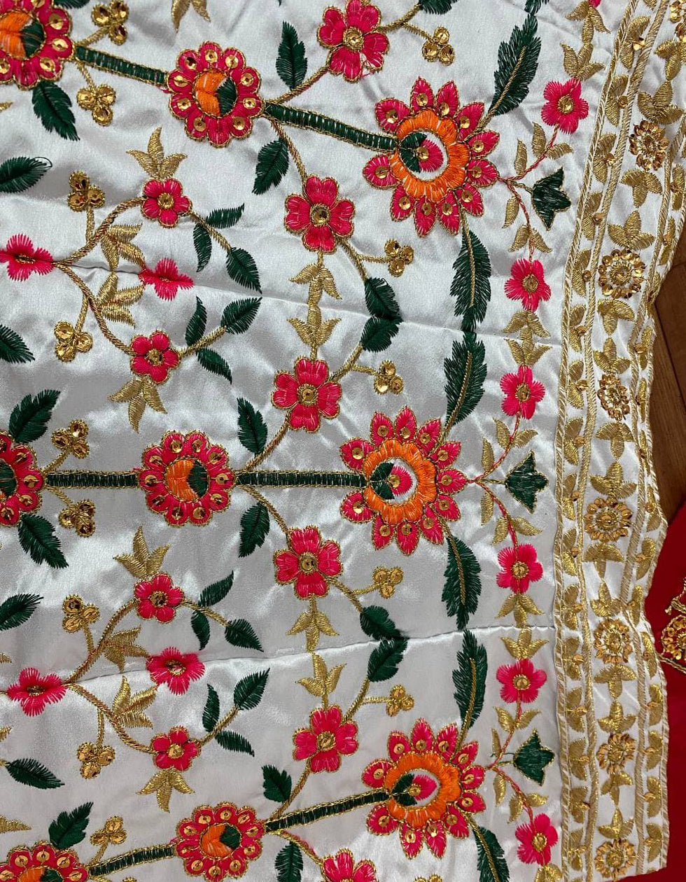Wedding Wear White & Maroon Floral Embroidered Lehenga With Zari Work
